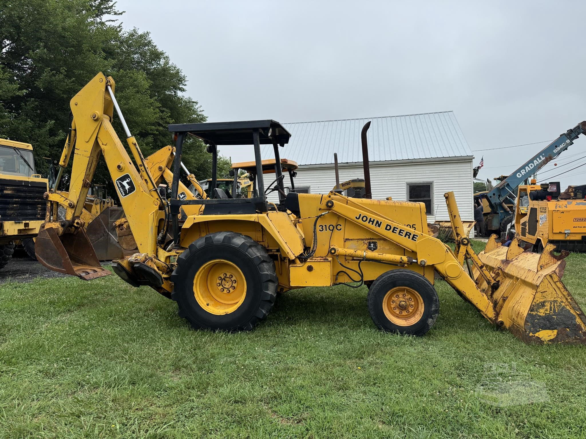 1990 Deere 310C — stock ATE-0042 — photograph 1