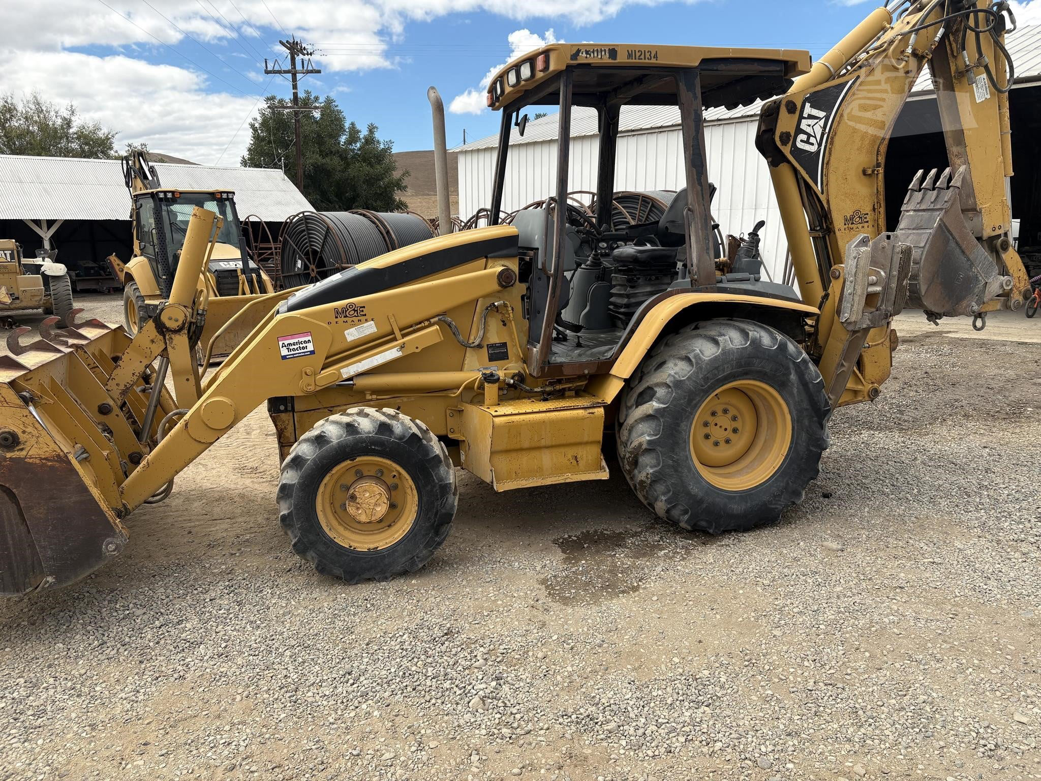 2002 Caterpillar 430D — stock ATE-0061 — photograph 1