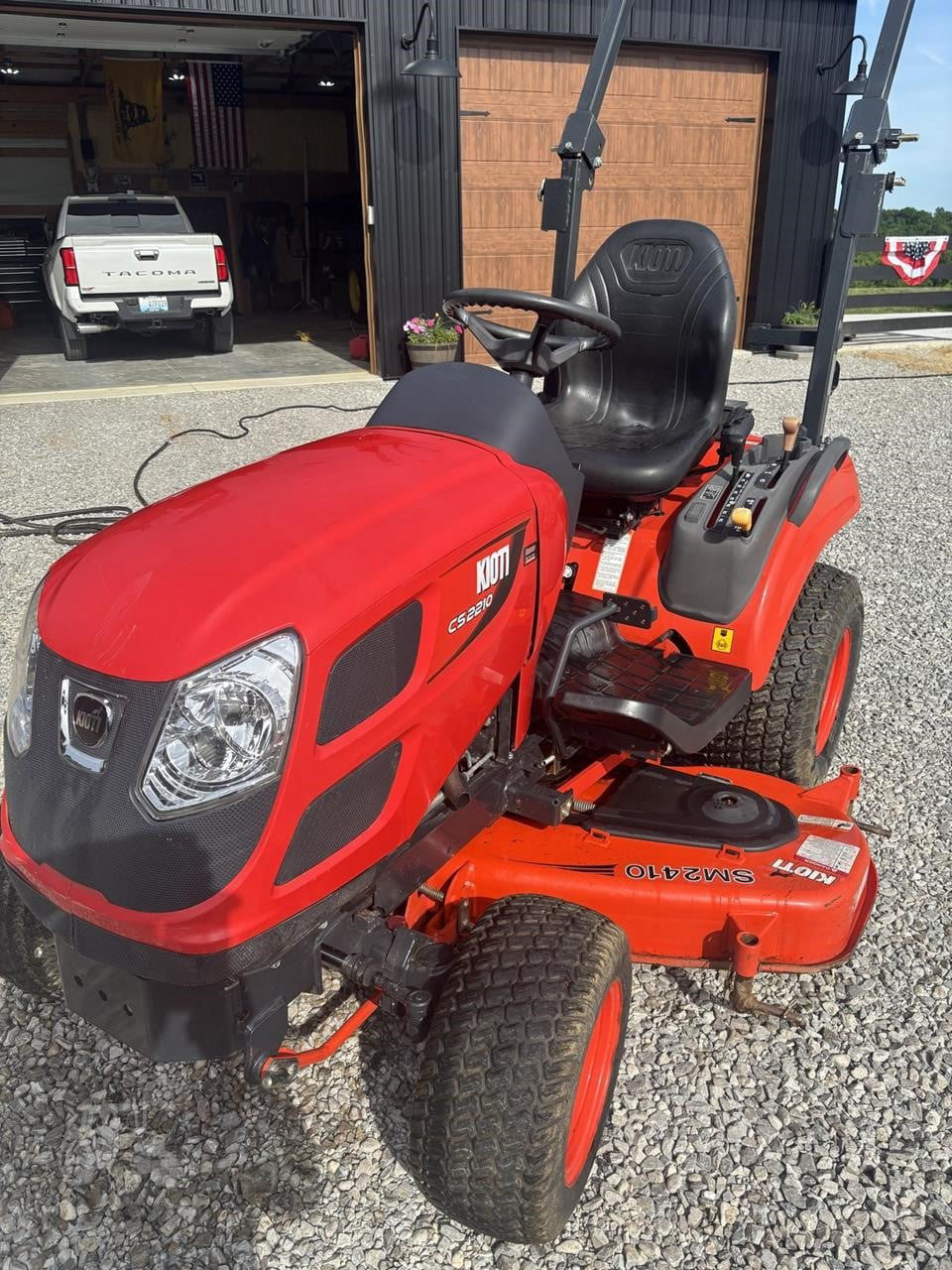 2020 Kioti CS2210 sub-compact tractor with mid-mount mower
